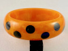 Shultz 33 marbled orange bakelti bangle with black dots